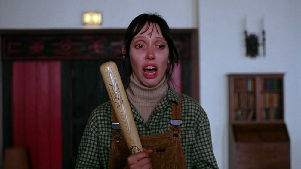 Shelley Duvall avec une batte de base ball dans The Shining